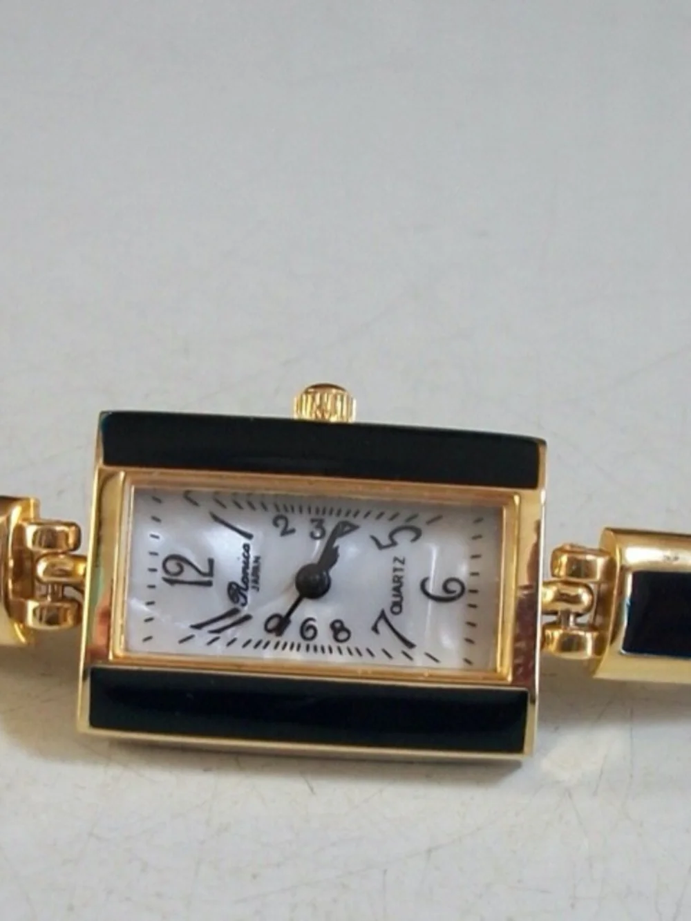 Women's bluish black with gold finish fashion dress up watch